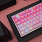 Pink gradient pattern on the transparent keycap